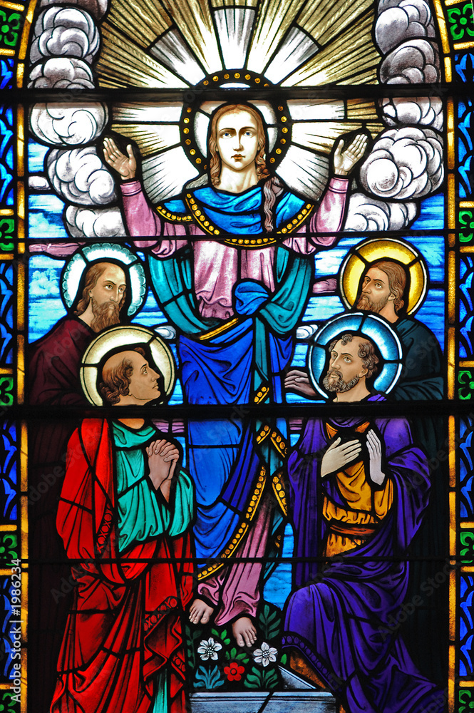 stained glass window of christ and his disciples