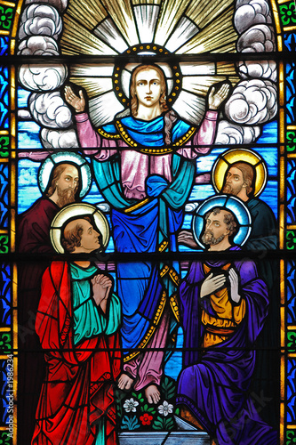 stained glass window of christ and his disciples