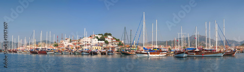 sailboats anchored in harbour