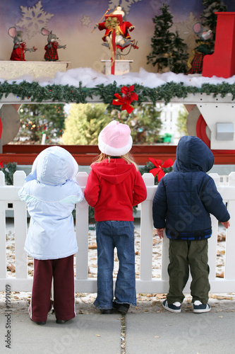 kids at christmas display photo