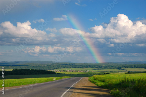 road, clouds and rainbow © Ivan Polushkin