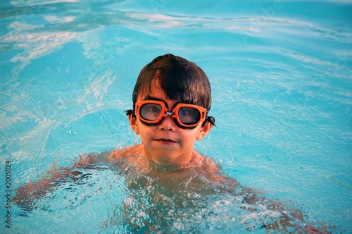 boy in a swimming pool © Wimbledon