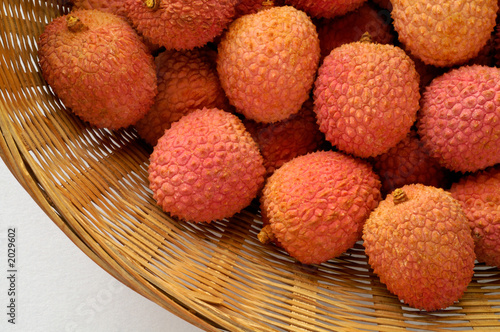 litchi lichee lychee - litchi chinensis in basket
