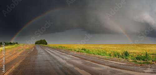 rainbow over road
