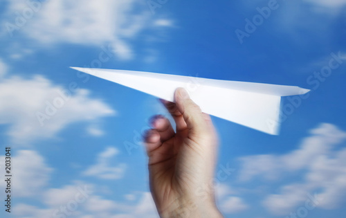throwing a paper plane.. , motion blur