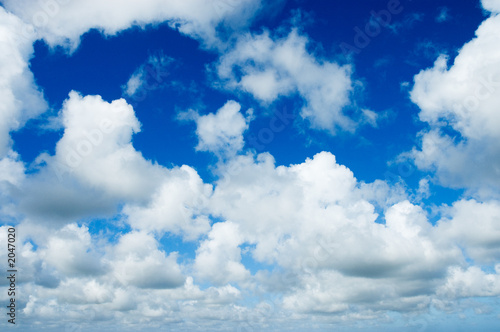 blue sky with fluffy white clouds