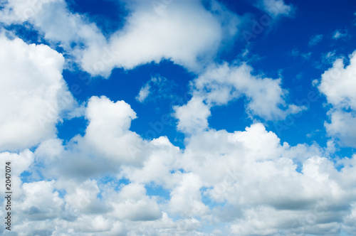 blue sky with fluffy white clouds