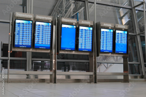 departure and arrival boards at the airport