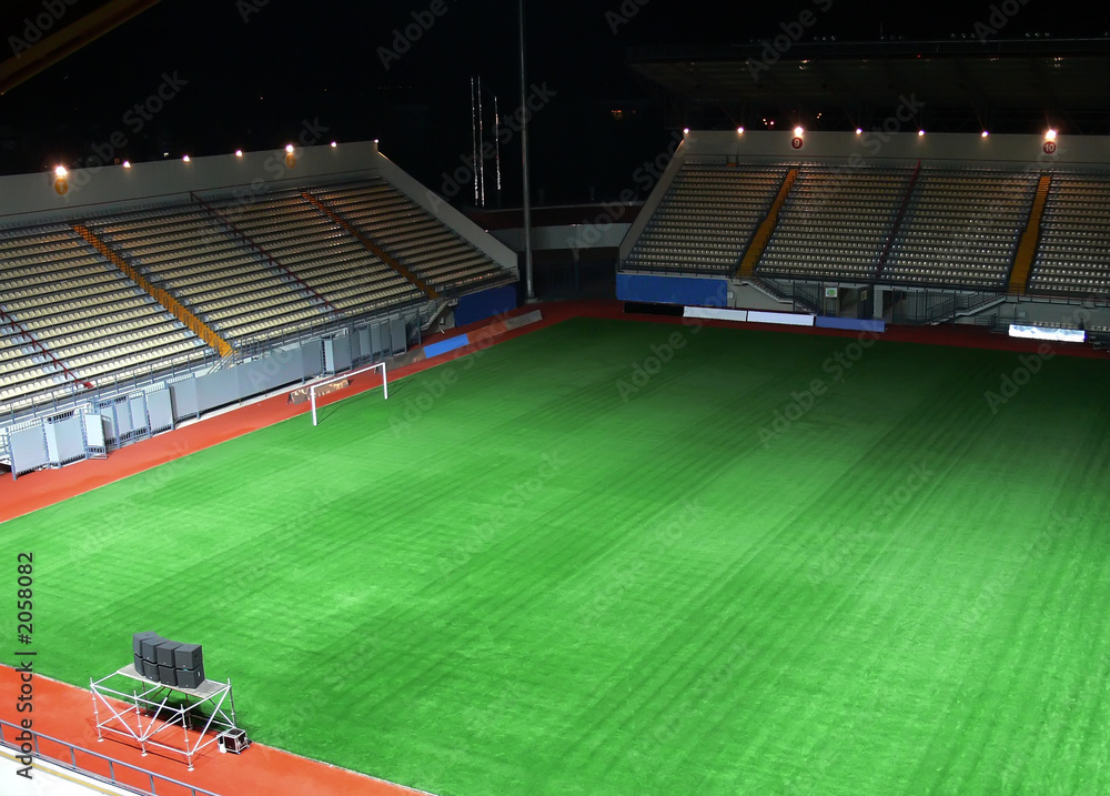 Obraz premium empty soccer stadium in the night