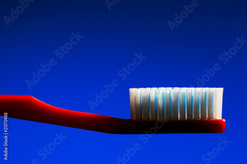 red tooth-brush