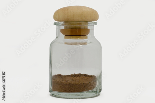 ground nutmeg in a jar