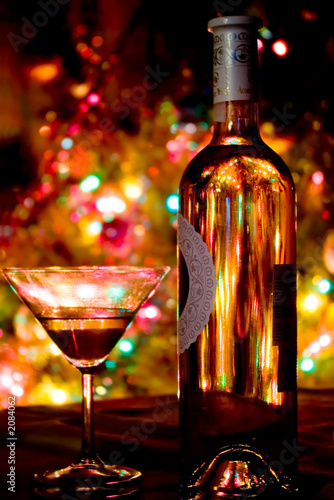 a glass of champagne on  lights background