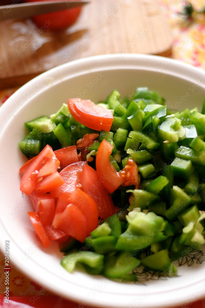 tomatoes and paprika - cooking in the kitchen