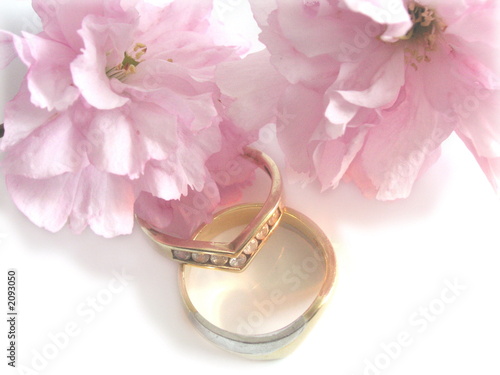 wedding rings and cherry blossom flowers