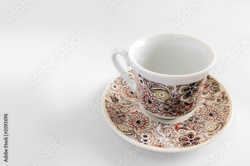 small decorative empty coffee cup