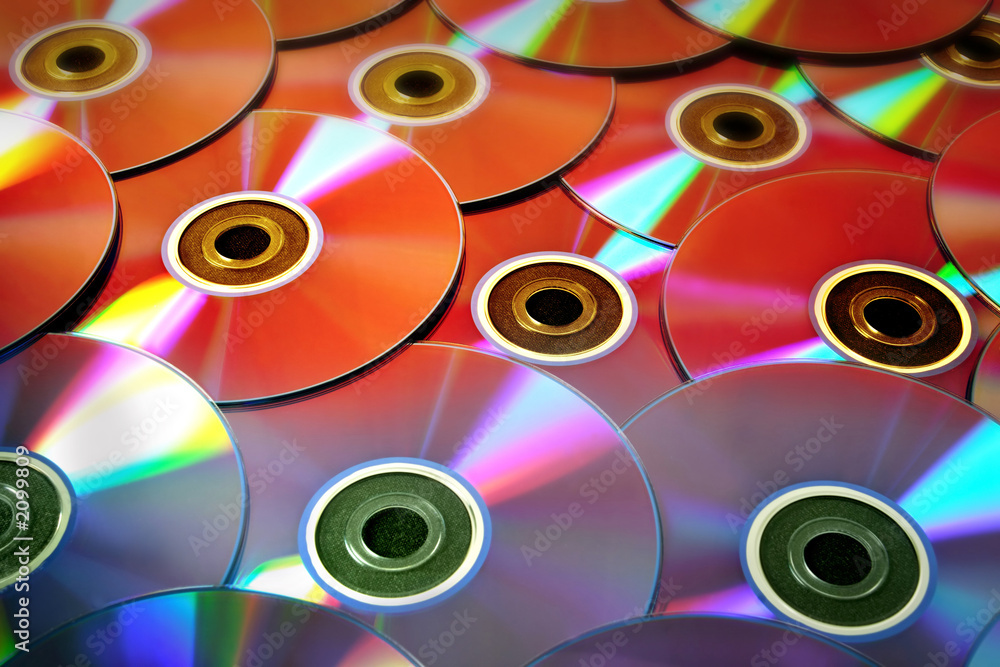 background of some colorful compact discs background of some colorful compact discs