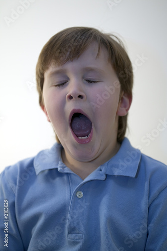 boy yawning