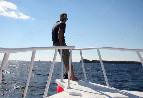 man on the sailing boat photo