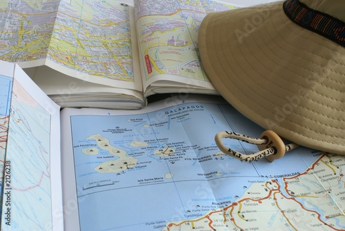 tourist maps and a cap