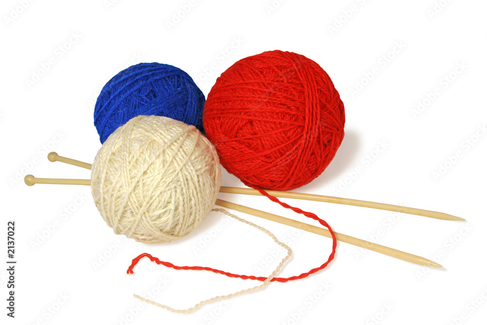 three knitting balls.