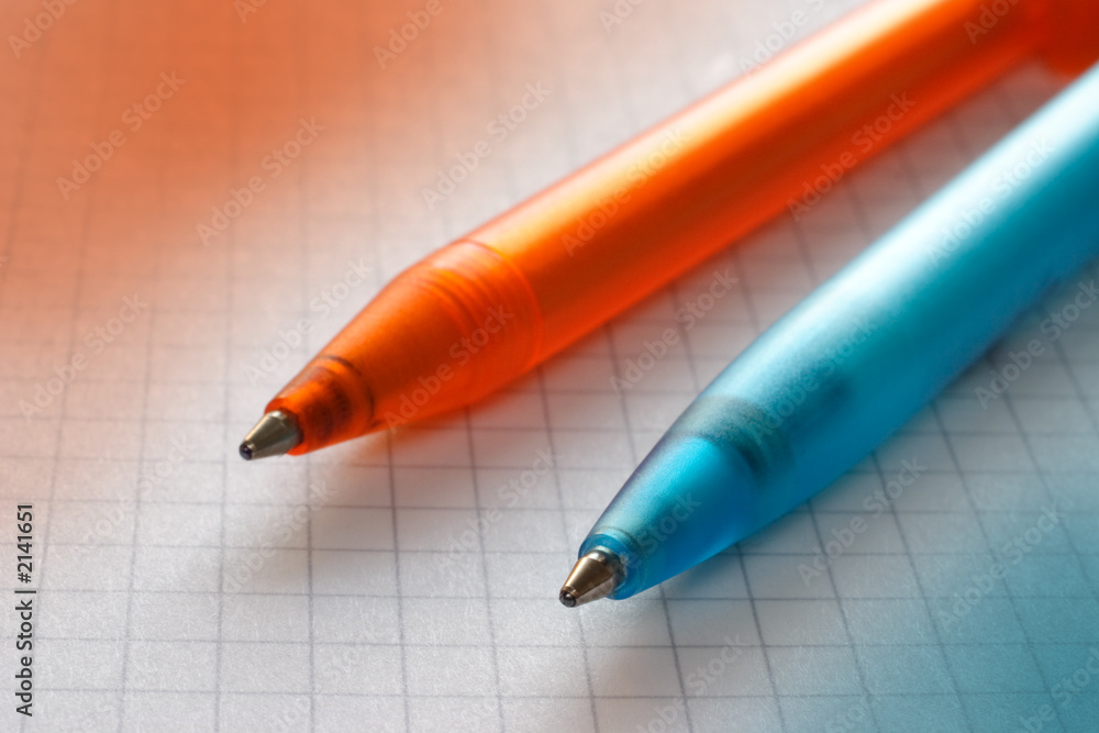 paper planner on top two pens paper planner on top two pens