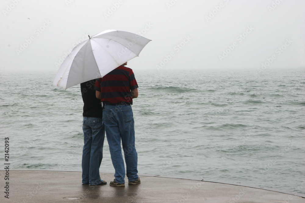 couple under umbrella couple under umbrella
