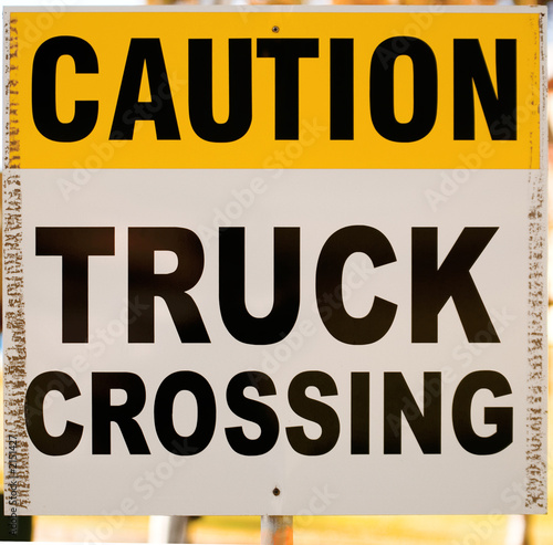 caution truck crossing