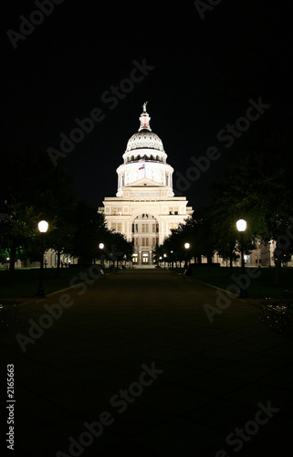 state capitol building at night in downtown austin, texas photo