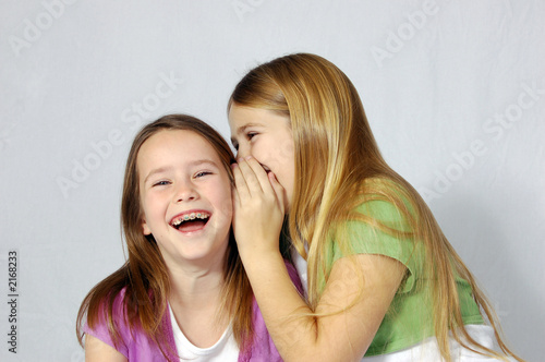 girls sharing a joke