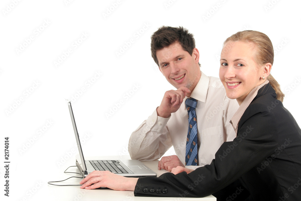 businesswoman and businessman sitting at desk with businesswoman and businessman sitting at desk with