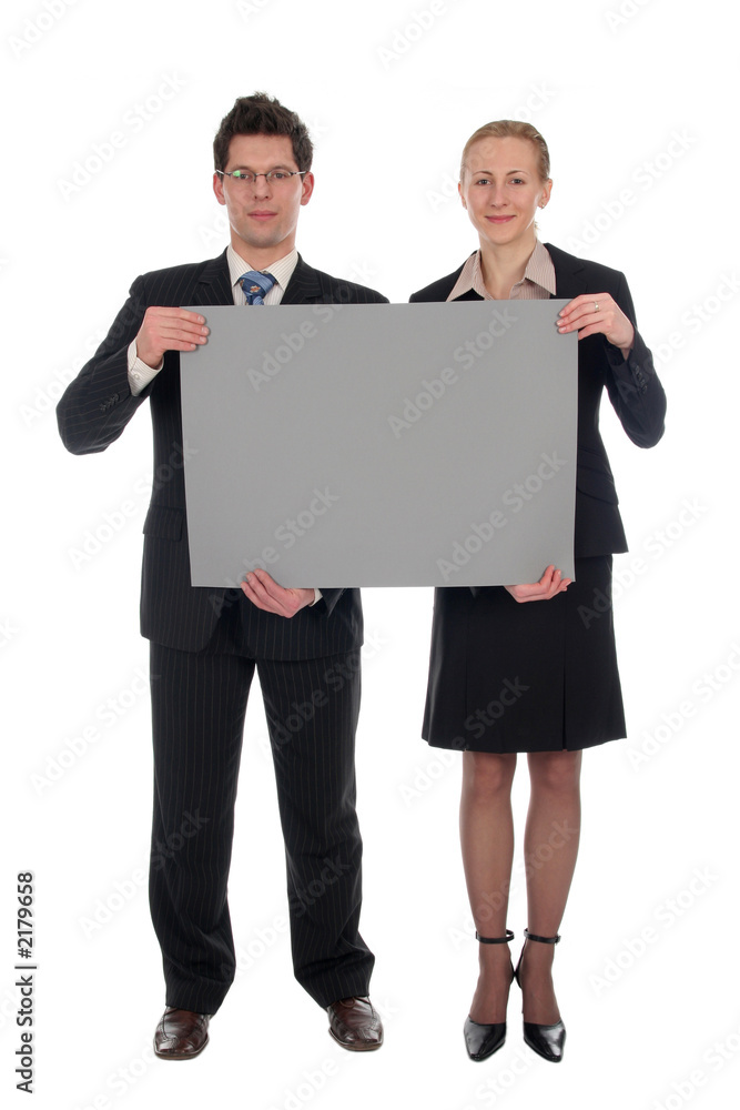businesswoman and businessman holding poster board businesswoman and businessman holding poster board