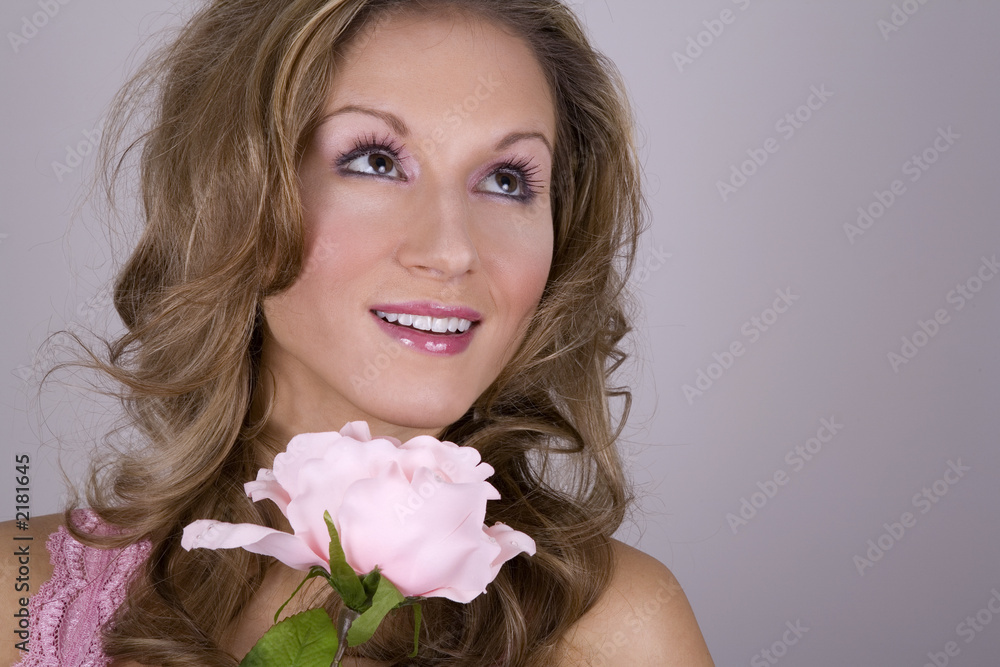 pretty blond holing pink rose pretty blond holing pink rose