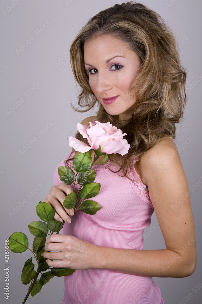 pretty blond holing pink rose pretty blond holing pink rose