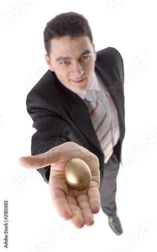 Foto man with gold egg
