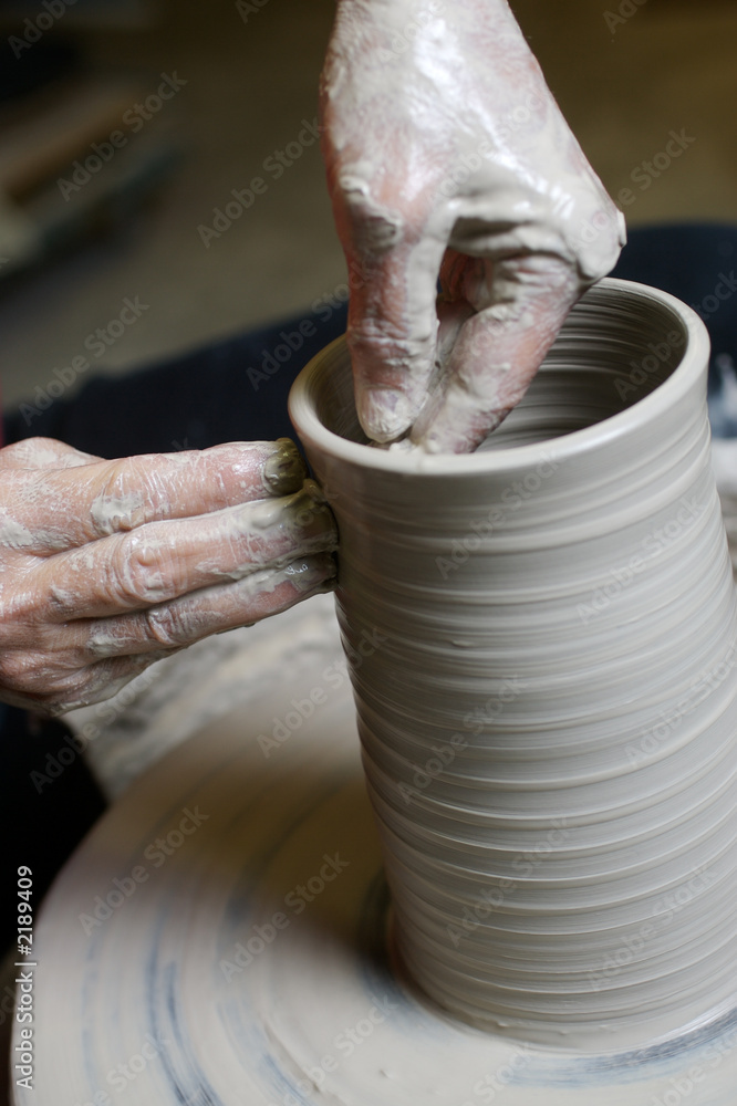 potter working clay