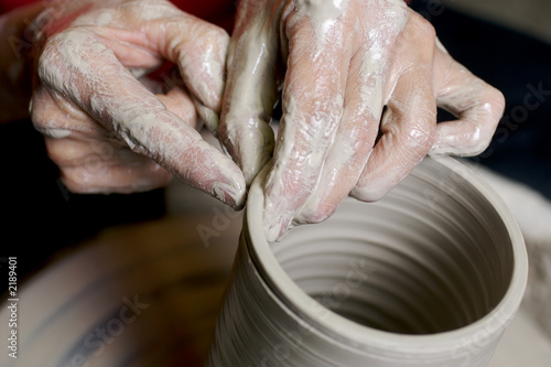 potter working clay