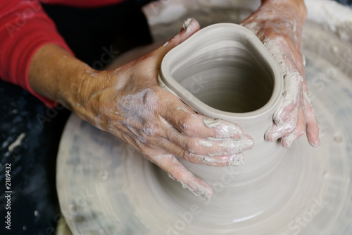 potter working clay