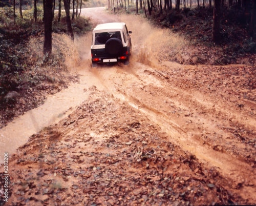 truck on the muddy dirt road