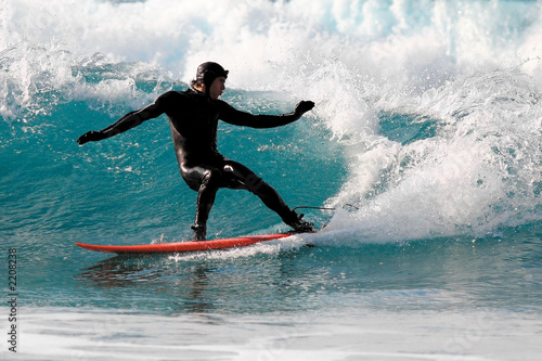 surfer executing a cutback maneuver