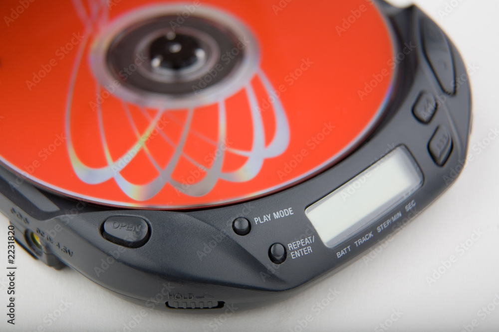 Fototapeta premium portable cd player with red disk
