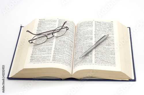 dictionary  & pen with glasses