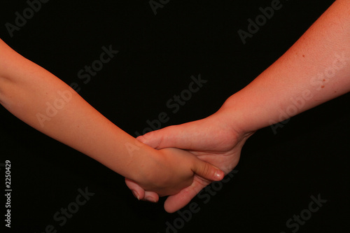 parent and child holding hands