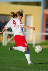 Papier peint photo Football Football féminin en pleine action  © razorconcept