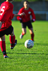 Papier peint photo Football Ballon de foot dans les filets  © razorconcept