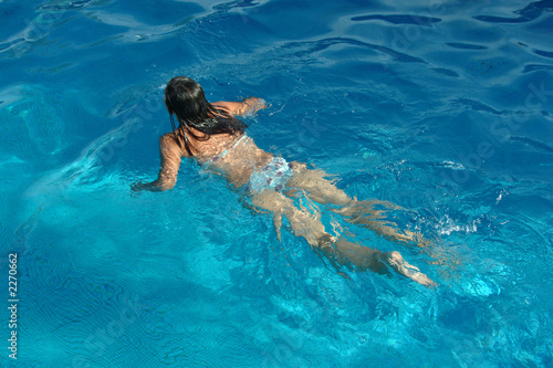 girl swimming in pool © JoLin
