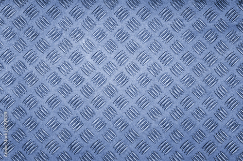 blue colored metal patterned background.