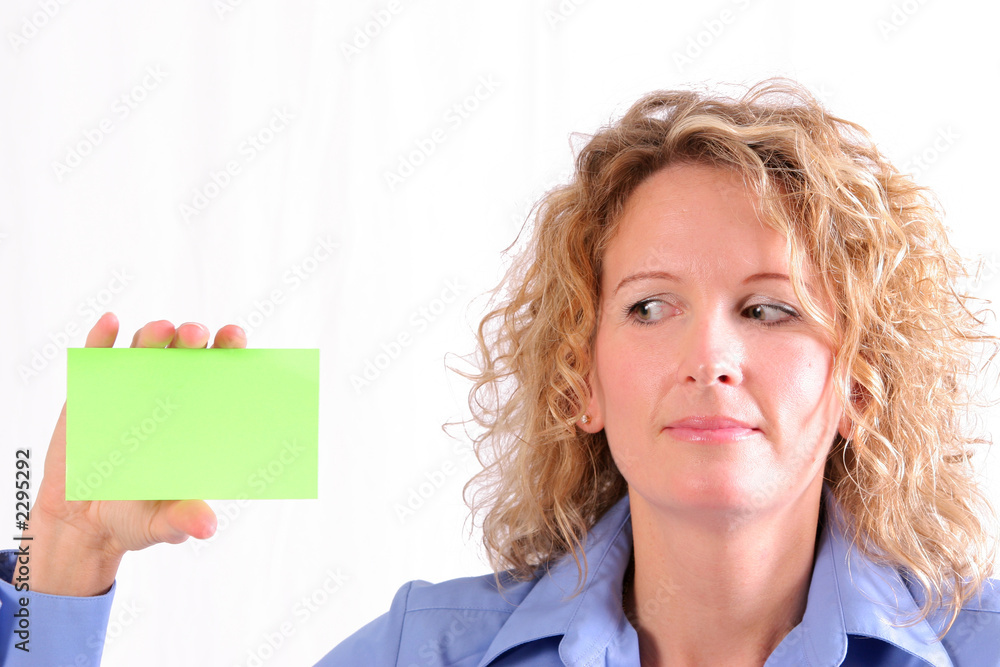 professional woman holding notecard