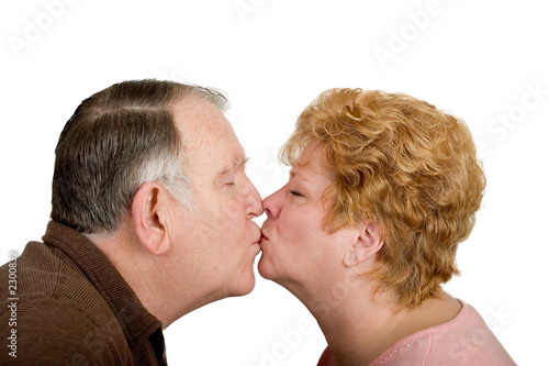 man and woman kissing