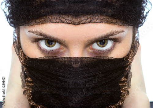 arabian woman close-ups green eye look photo
