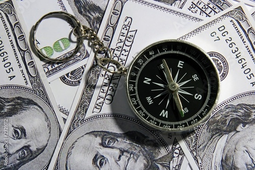 compass over money